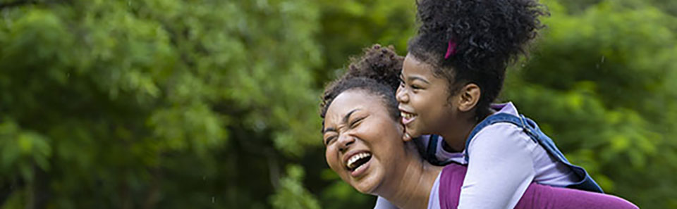 Mother and daughter in the park