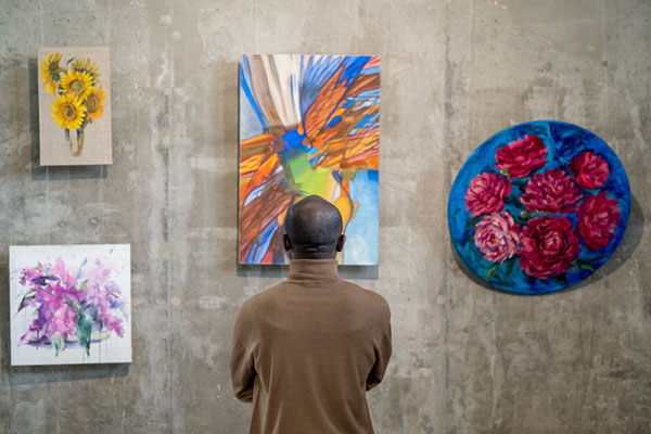 Person looking at the art