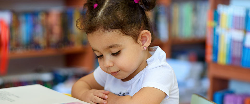 Library young child reading