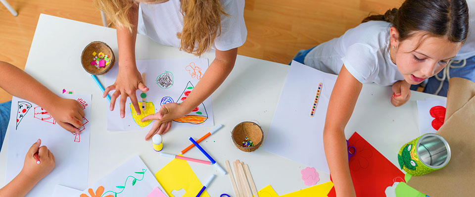 Children doing craft's indoors