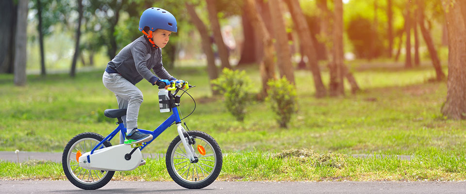 Boy cycling in the park 