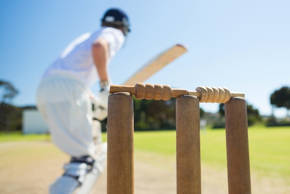 Man playing cricket