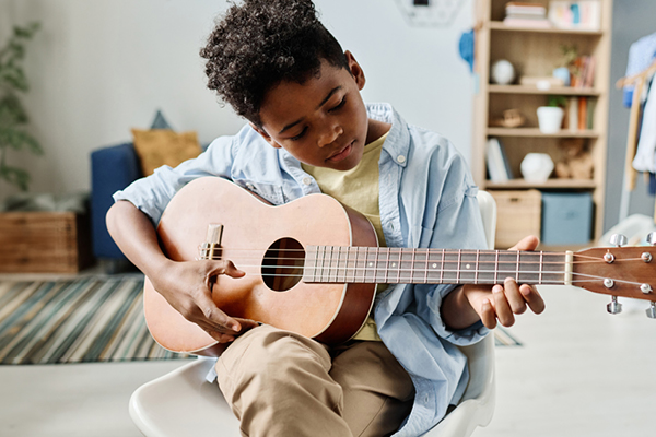 Child playing music