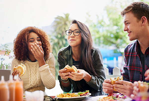 Friends eating out together