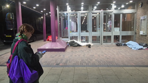 Outreach worker checks on people sleeping rough in Ilford