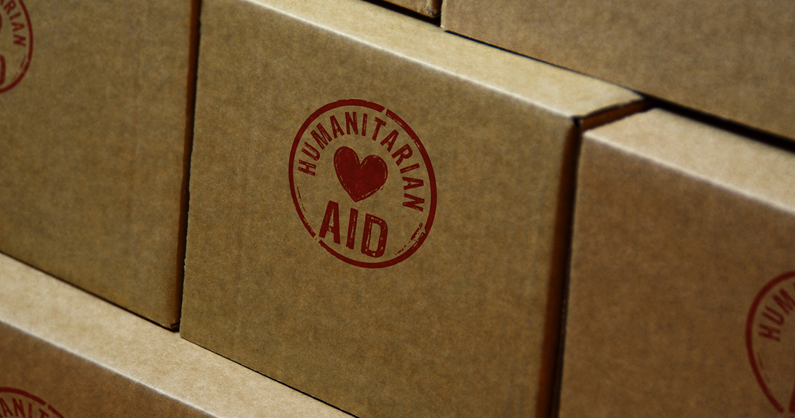Humanitarian Aid stamp printed on cardboard box
