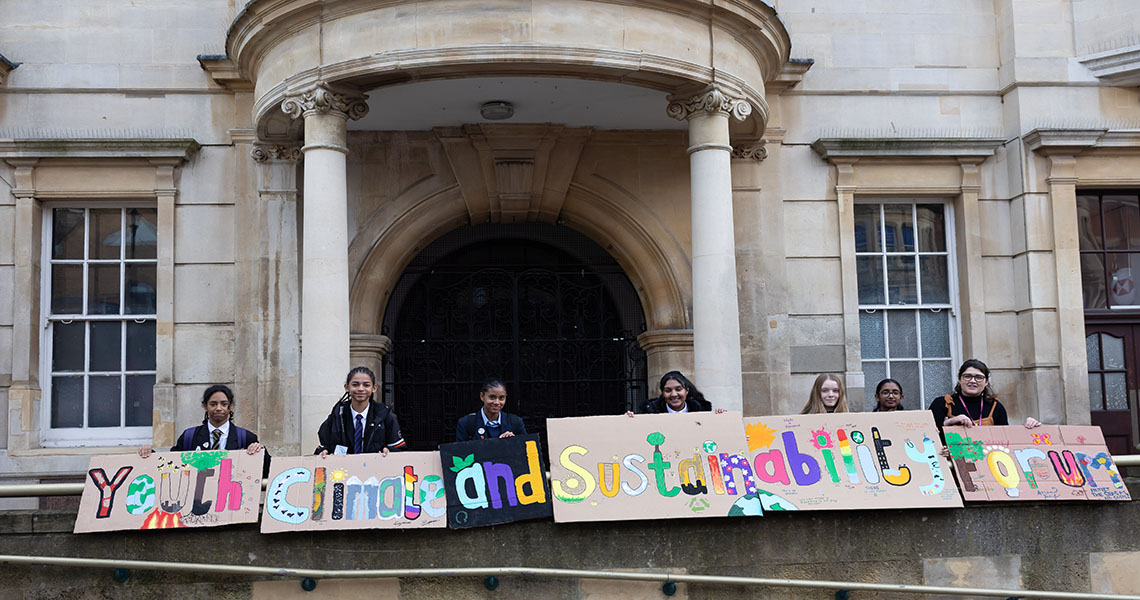 students holding banner