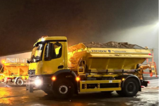 A grit lorry, full of grit at night-time
