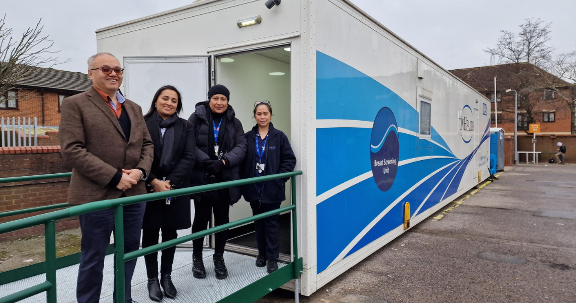 Councillor Santos and staff welcoming people into the breast screening unit in Ilford