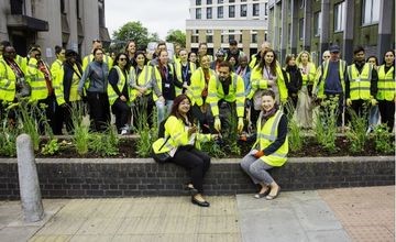 group of volunteers posing for photo