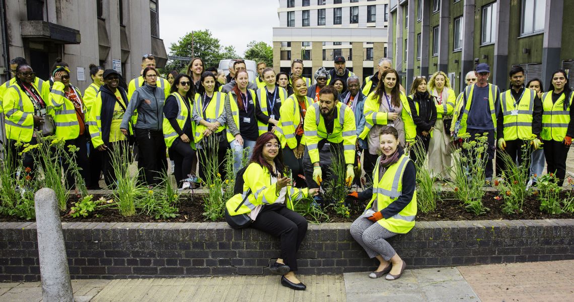 group of volunteers posing for photo