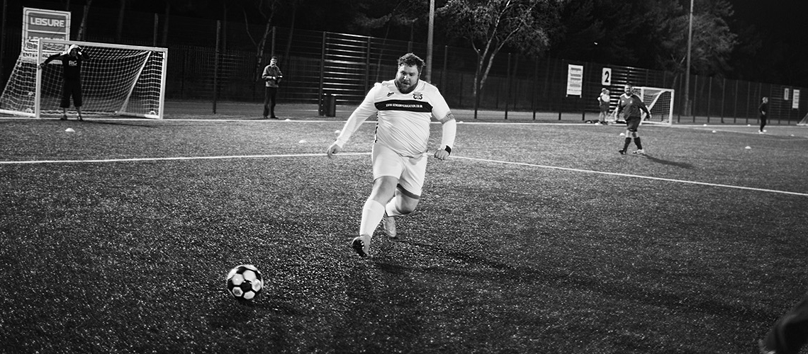 man playing football