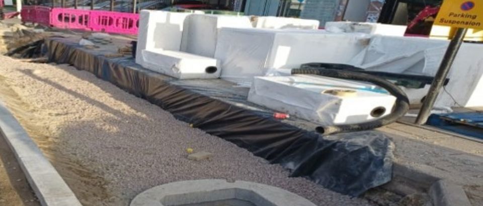 works to install hydrorock scheme under the road